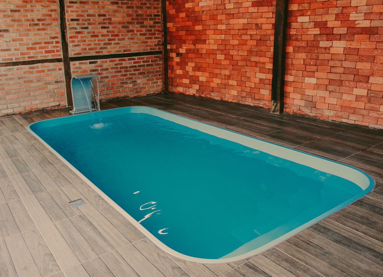 Quatro Estrelas Inn